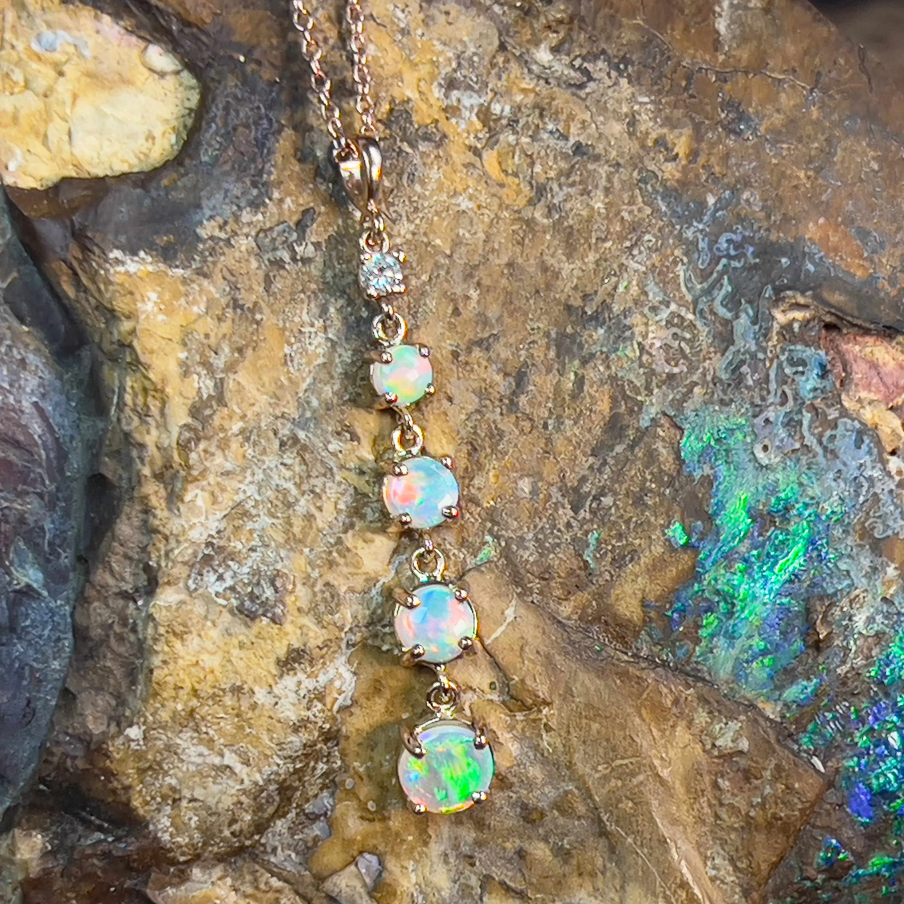 14kt Rose Gold Fire Opal and diamond dangling pendant