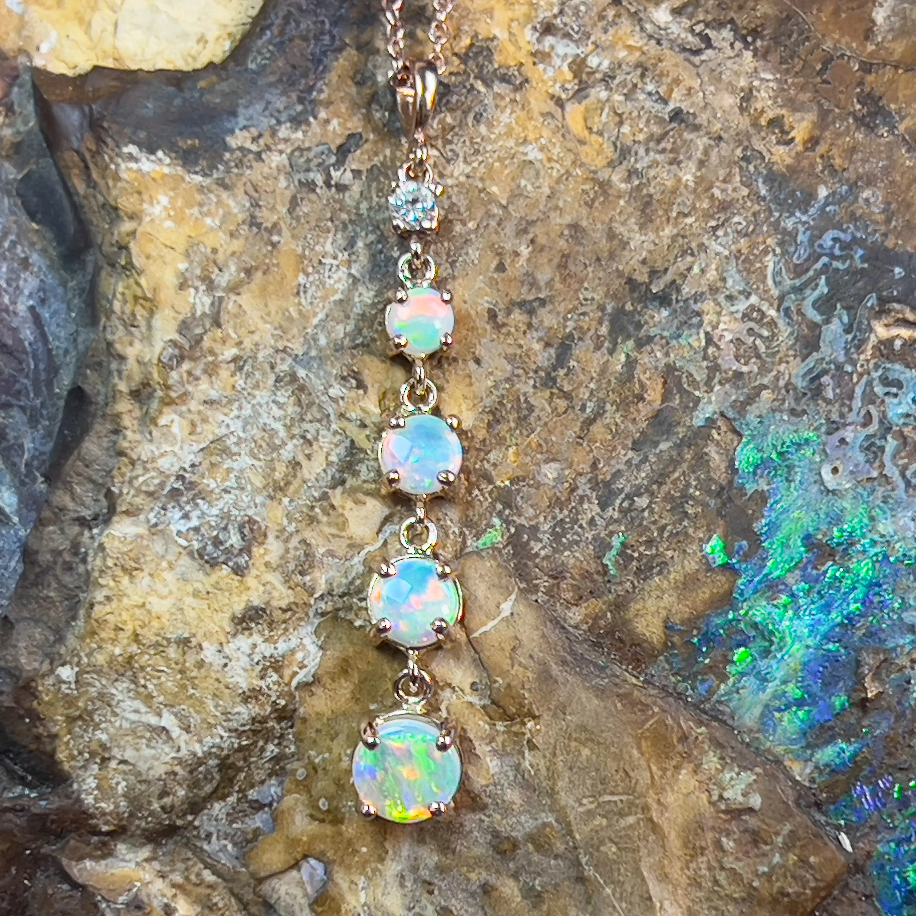 14kt Rose Gold Fire Opal and diamond dangling pendant