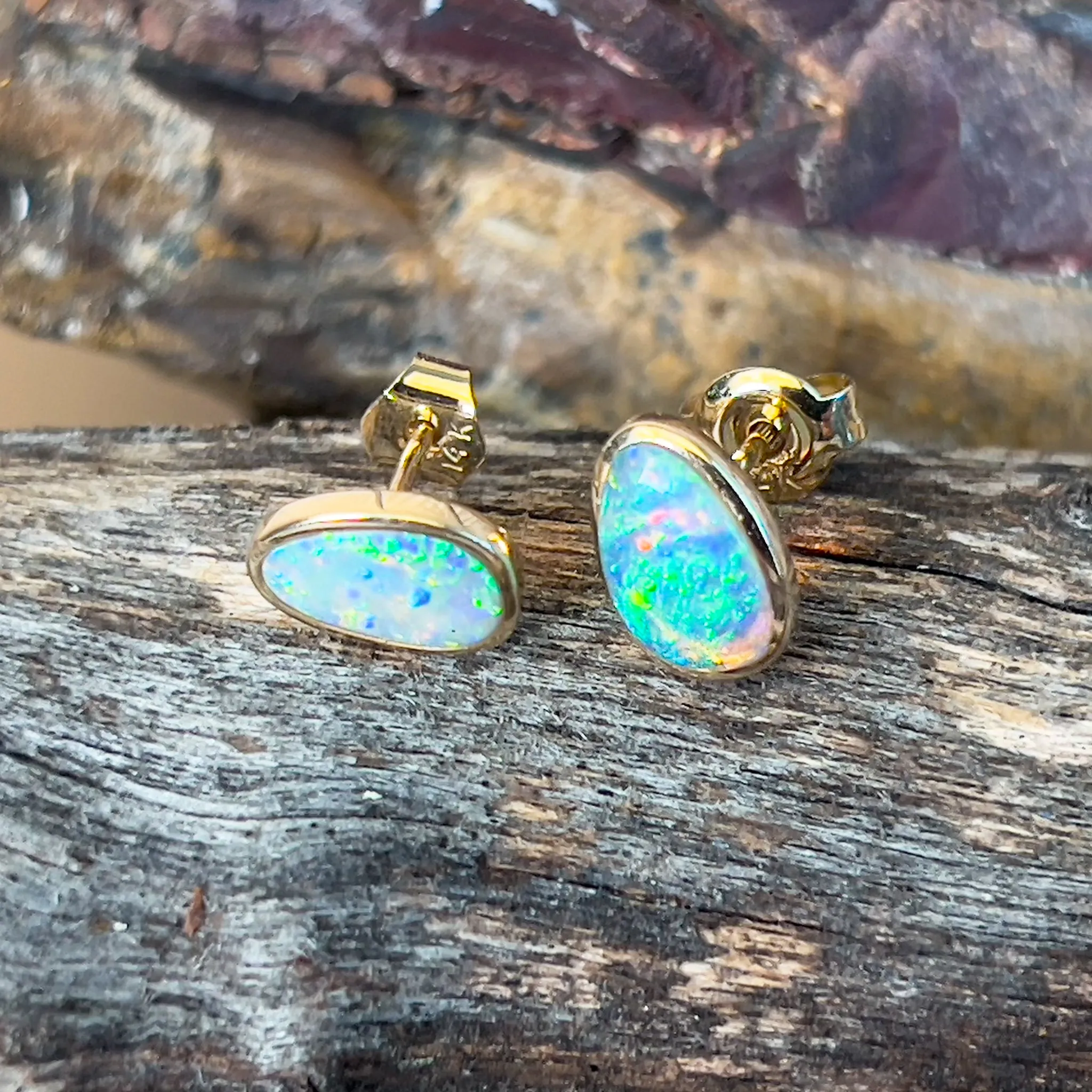 14kt Yellow Gold Black Opal 0.75ct bezel studs