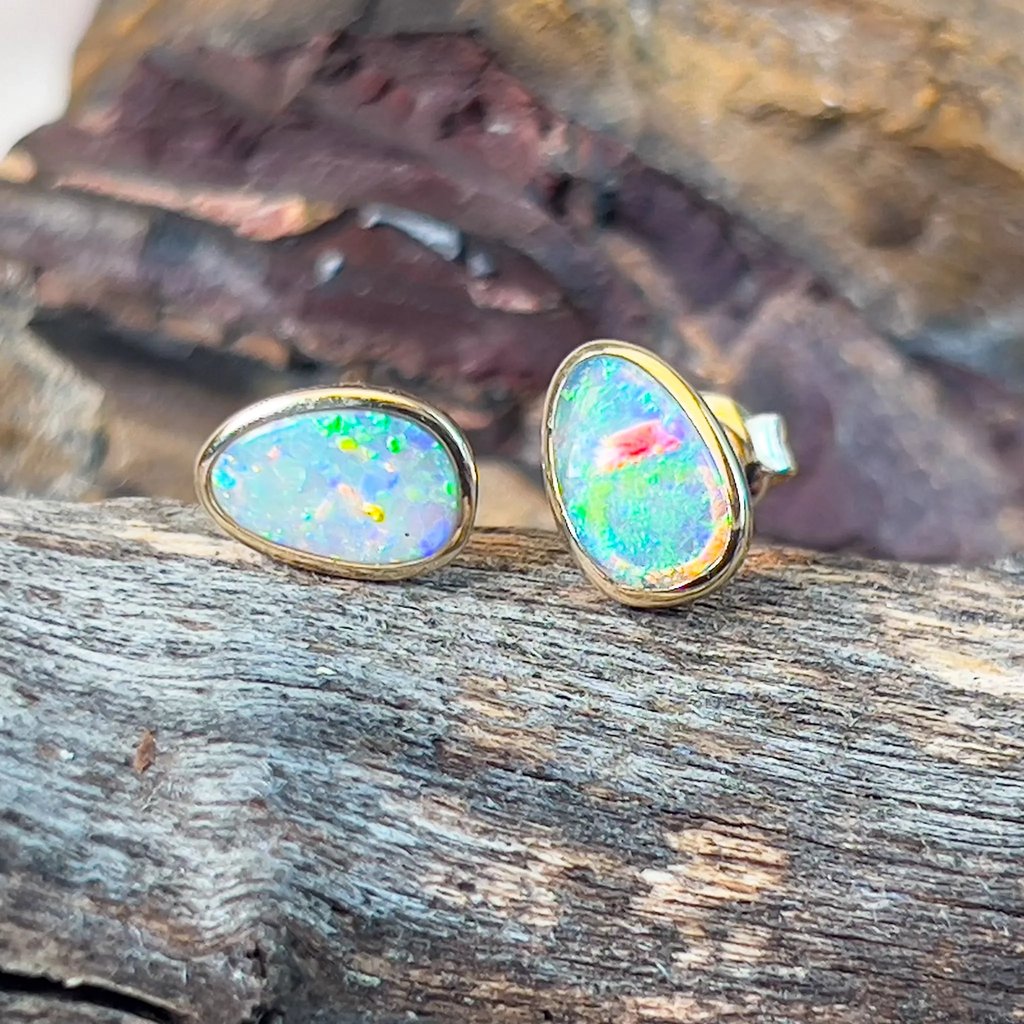 14kt Yellow Gold Black Opal 0.75ct bezel studs