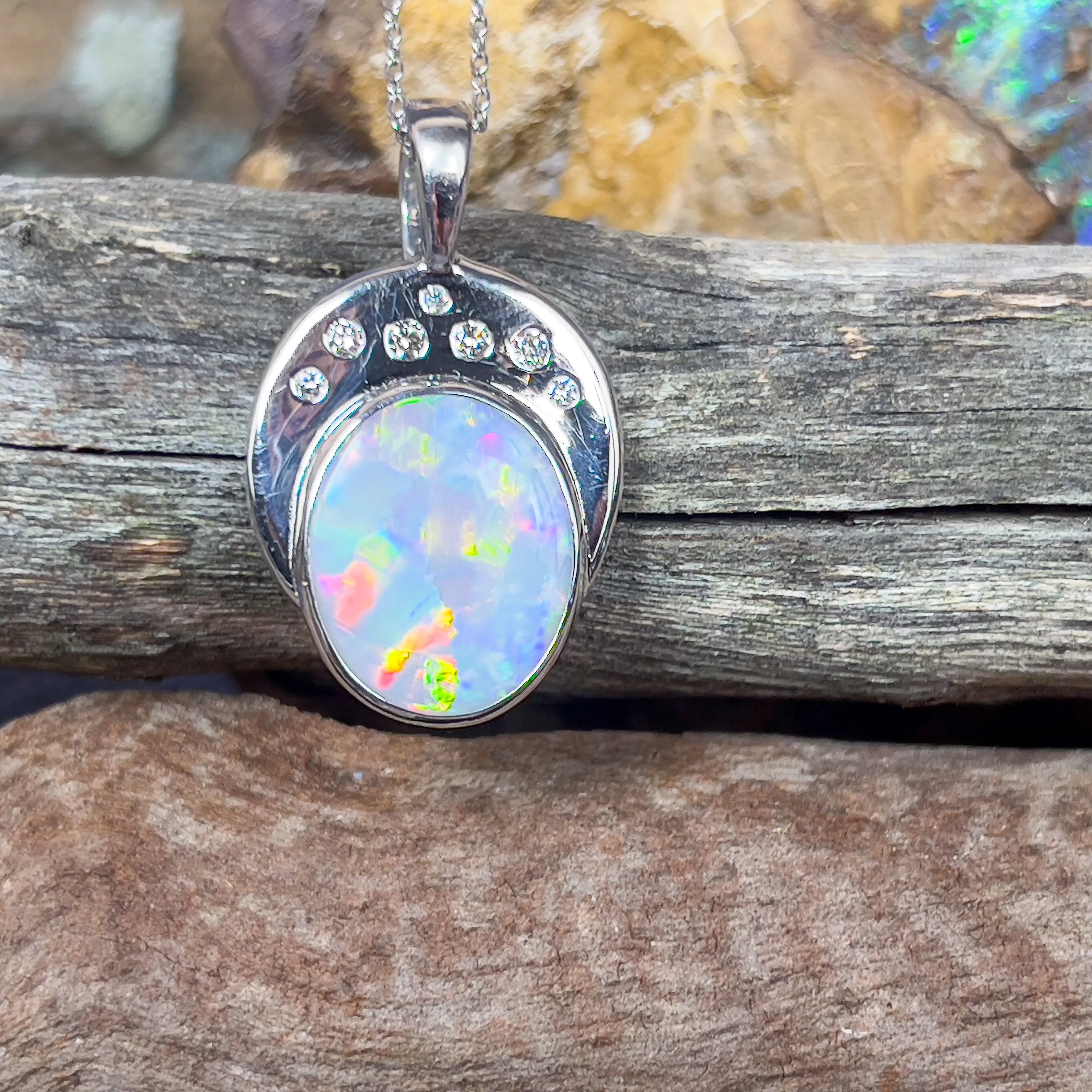 18kt Black Opal Oval 5.8ct and 7 Diamonds pendant enhancer