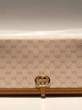 1980s Gucci Brown Cream interlocking logo clutch monogram wallet