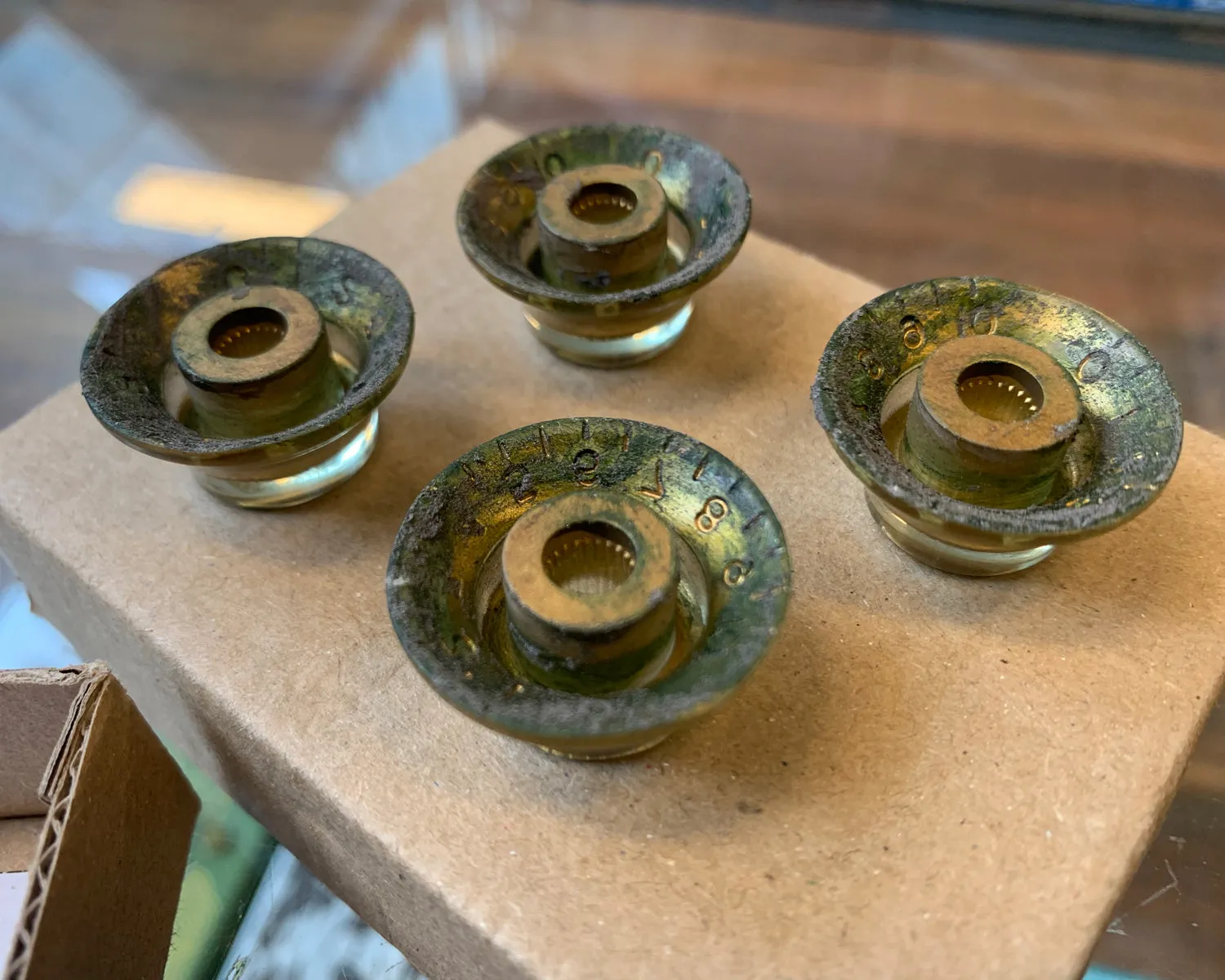 59 Parts Aged Top Hat Bell Knobs - Amber