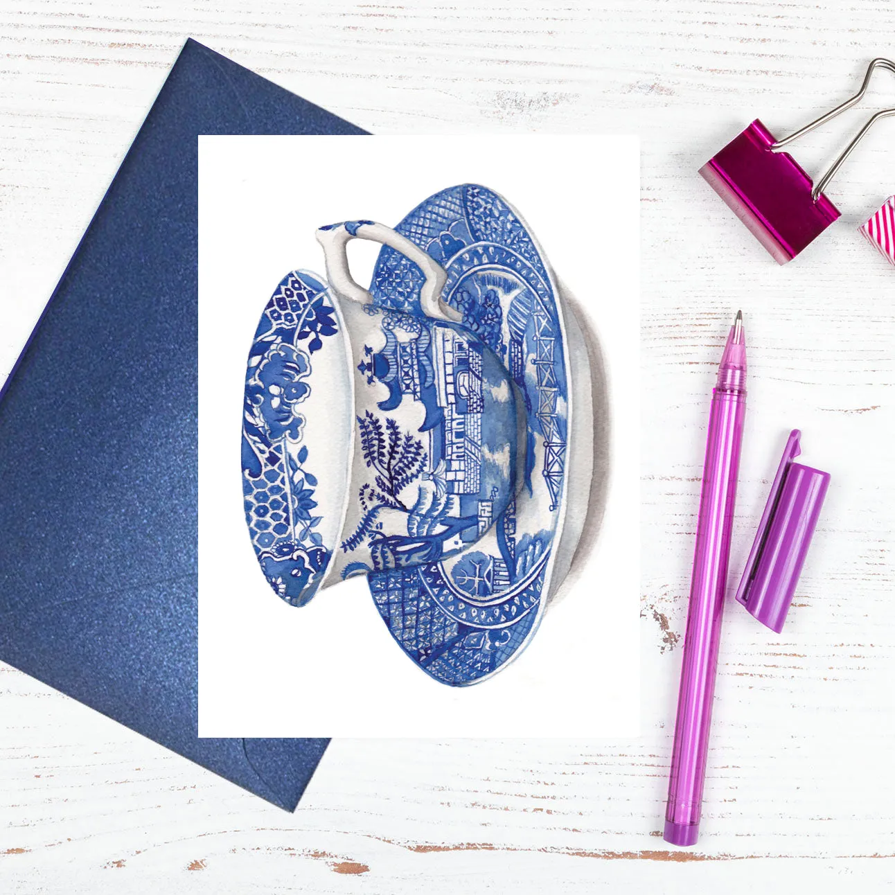 A blue and white Spode Willow design cup and saucer card