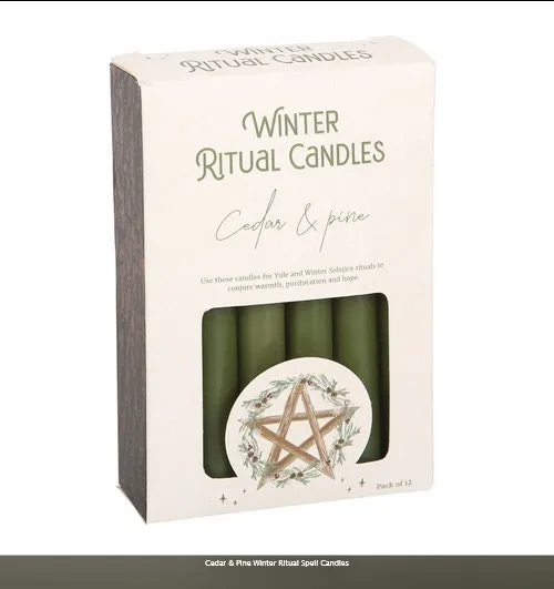 A pack of 12 Winter Ritual candles in a Cedar and Pine fragrance.