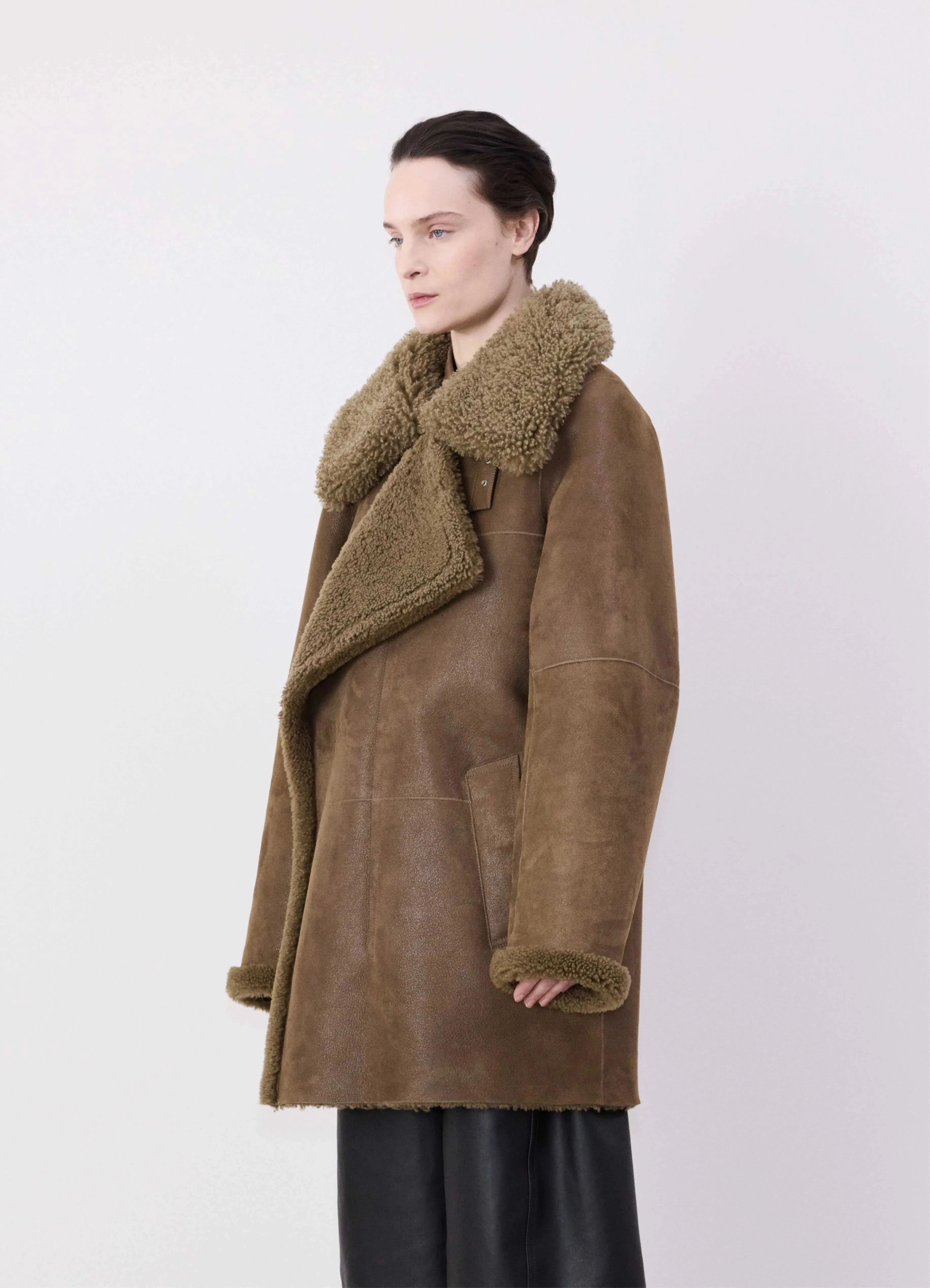 ASYMMETRICAL SHEARLING COAT