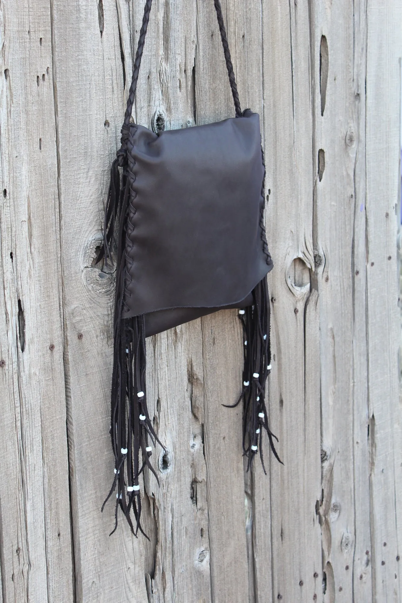 Brown leather handbag, fringed boho hippie style crossbody bag