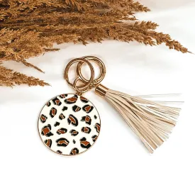 Circle Pendant Key Chain with Ivory Tassel in White Leopard Print