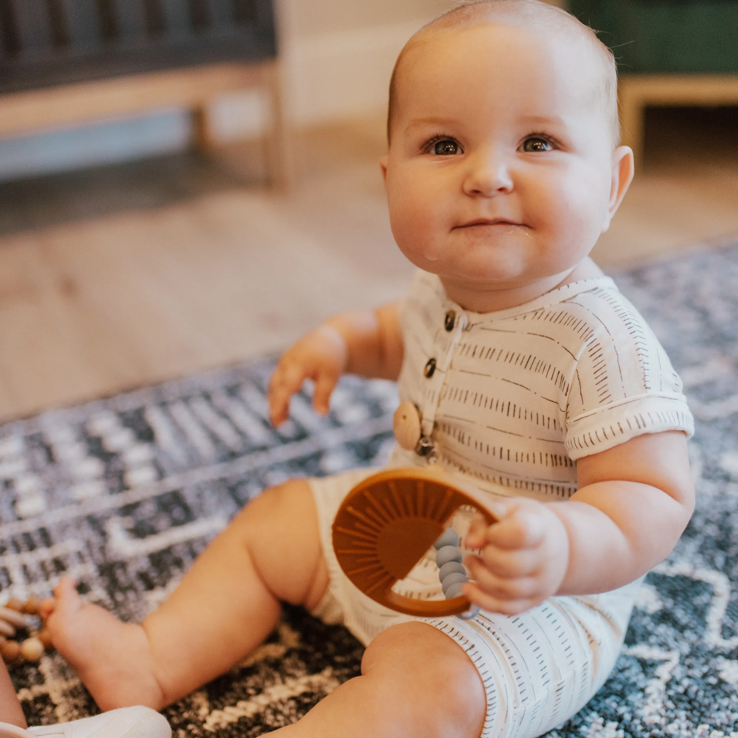 Cream Sunburst Teething Toy