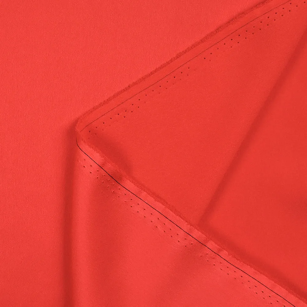 Crêpe satin de polyester uni rouge corail