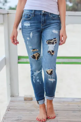 Distressed Denim Jeans with Leopard Print Detail