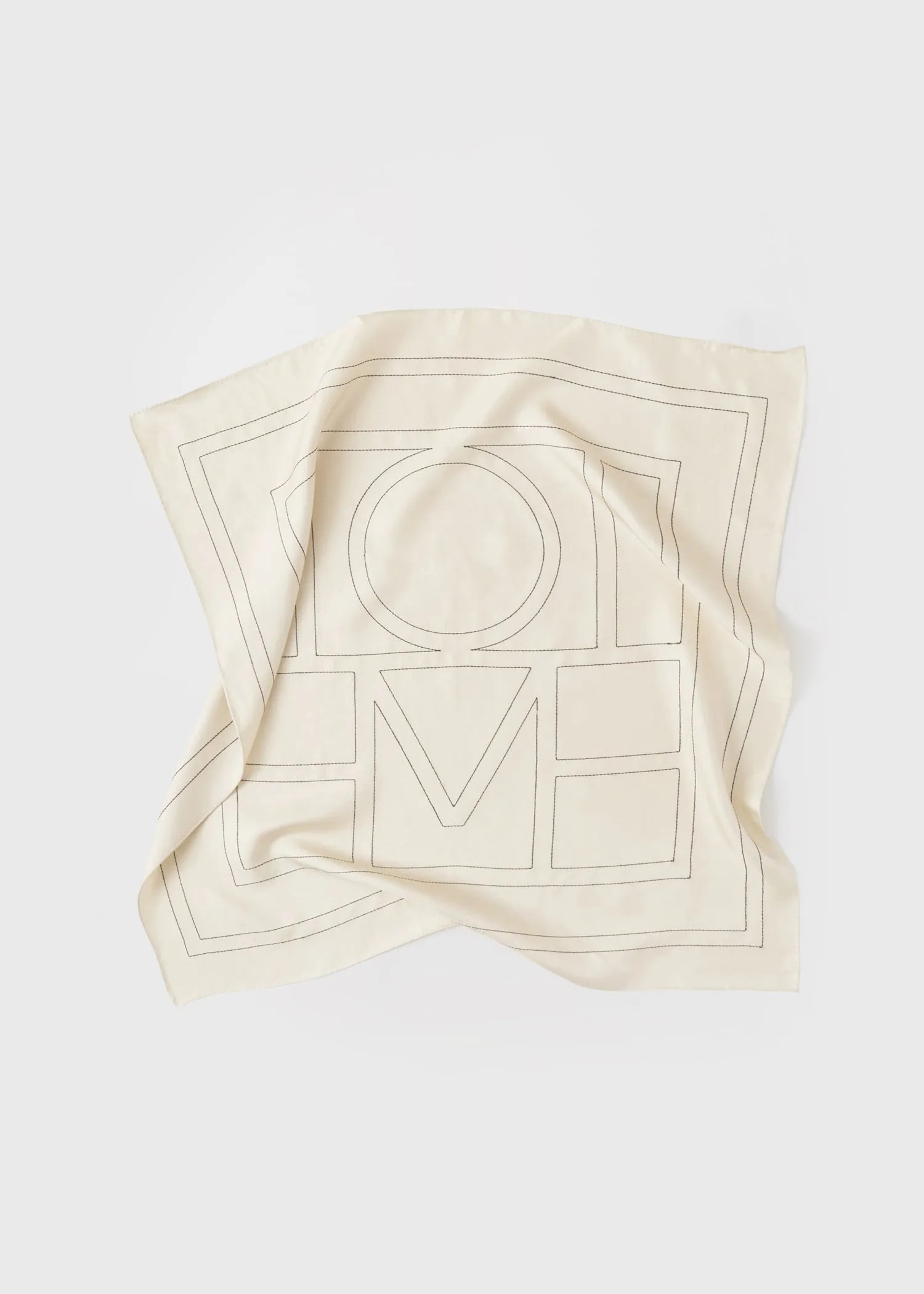 Embroidered monogram silk scarf creme