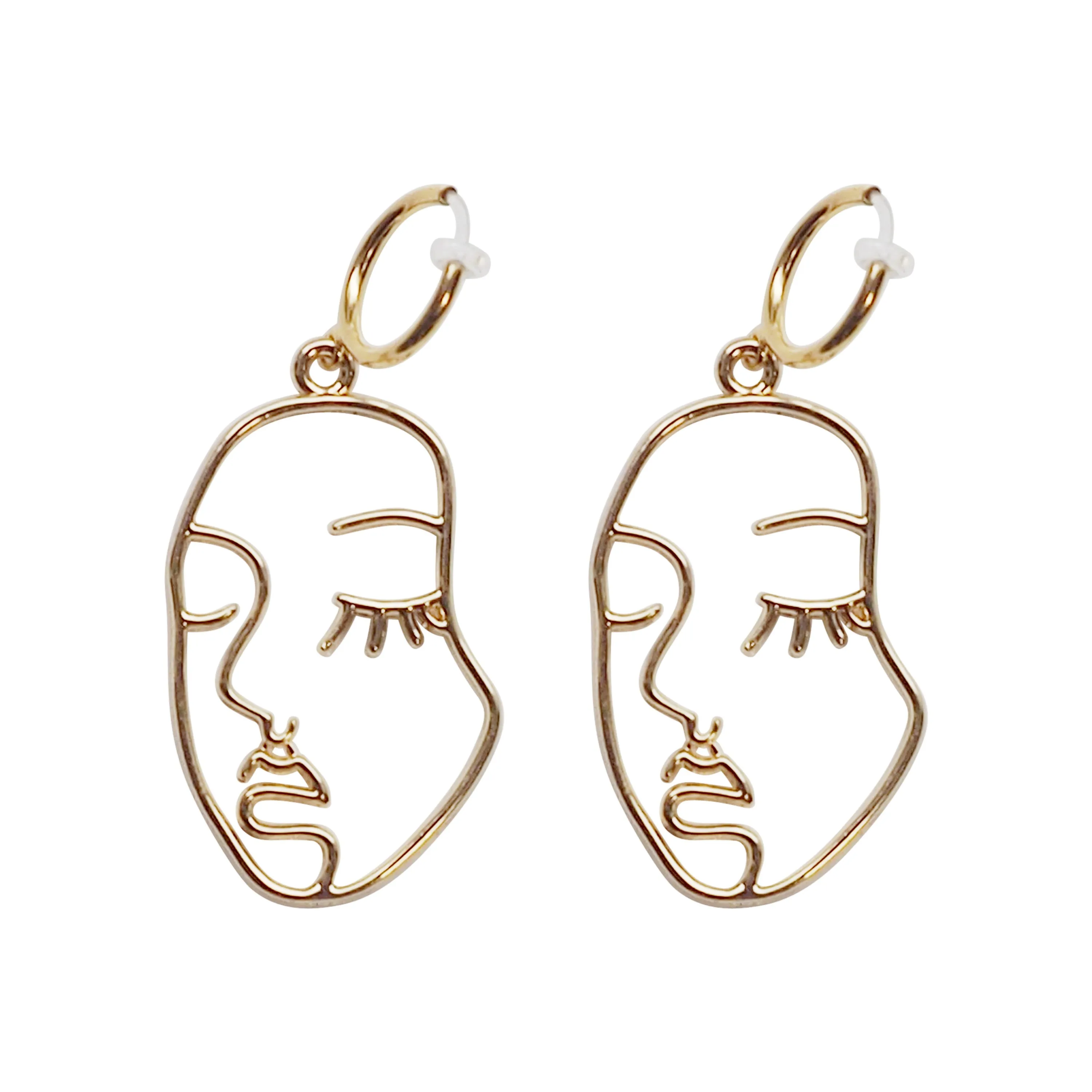 Gold human face clip on hoop earrings