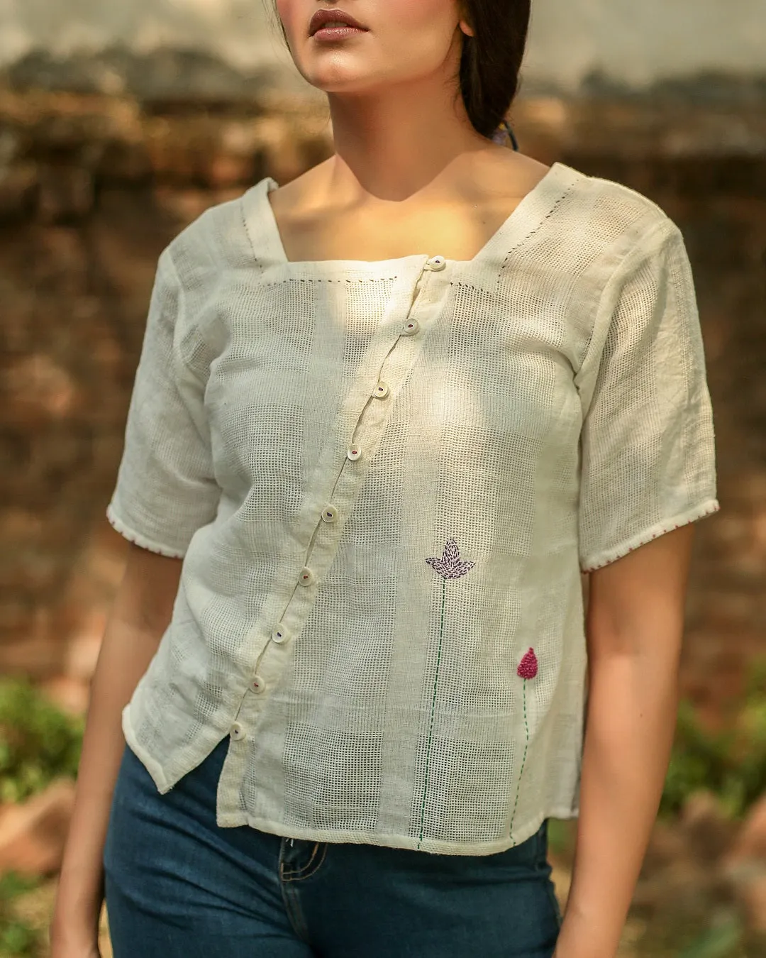 Kora embroidered button top