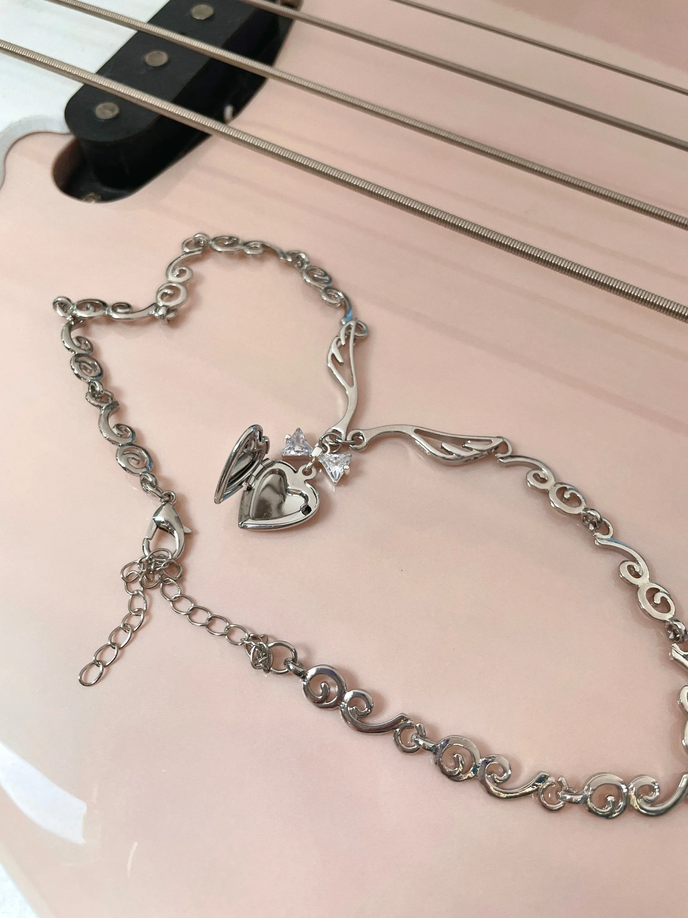 Meri Angel Wings Locket Bow Choker