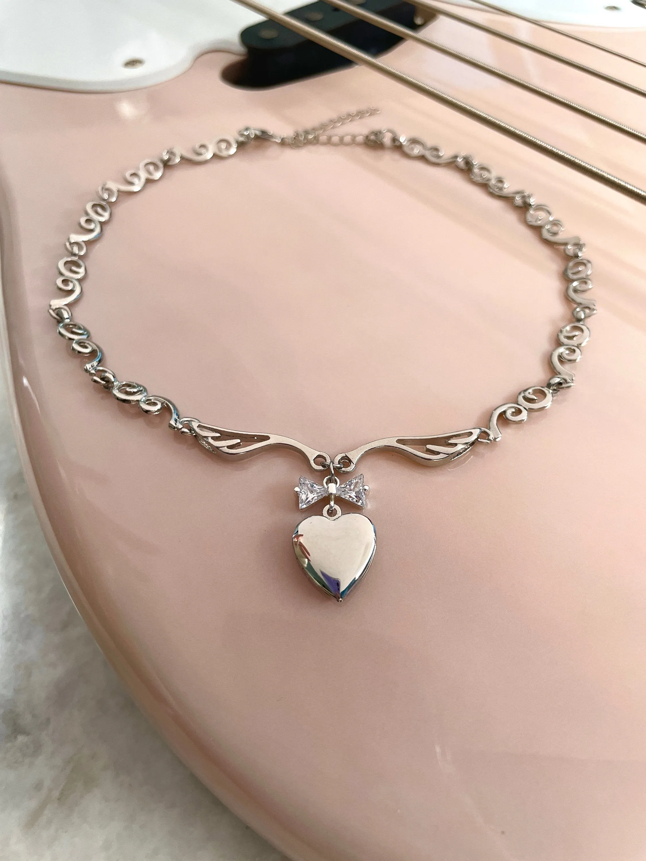 Meri Angel Wings Locket Bow Choker