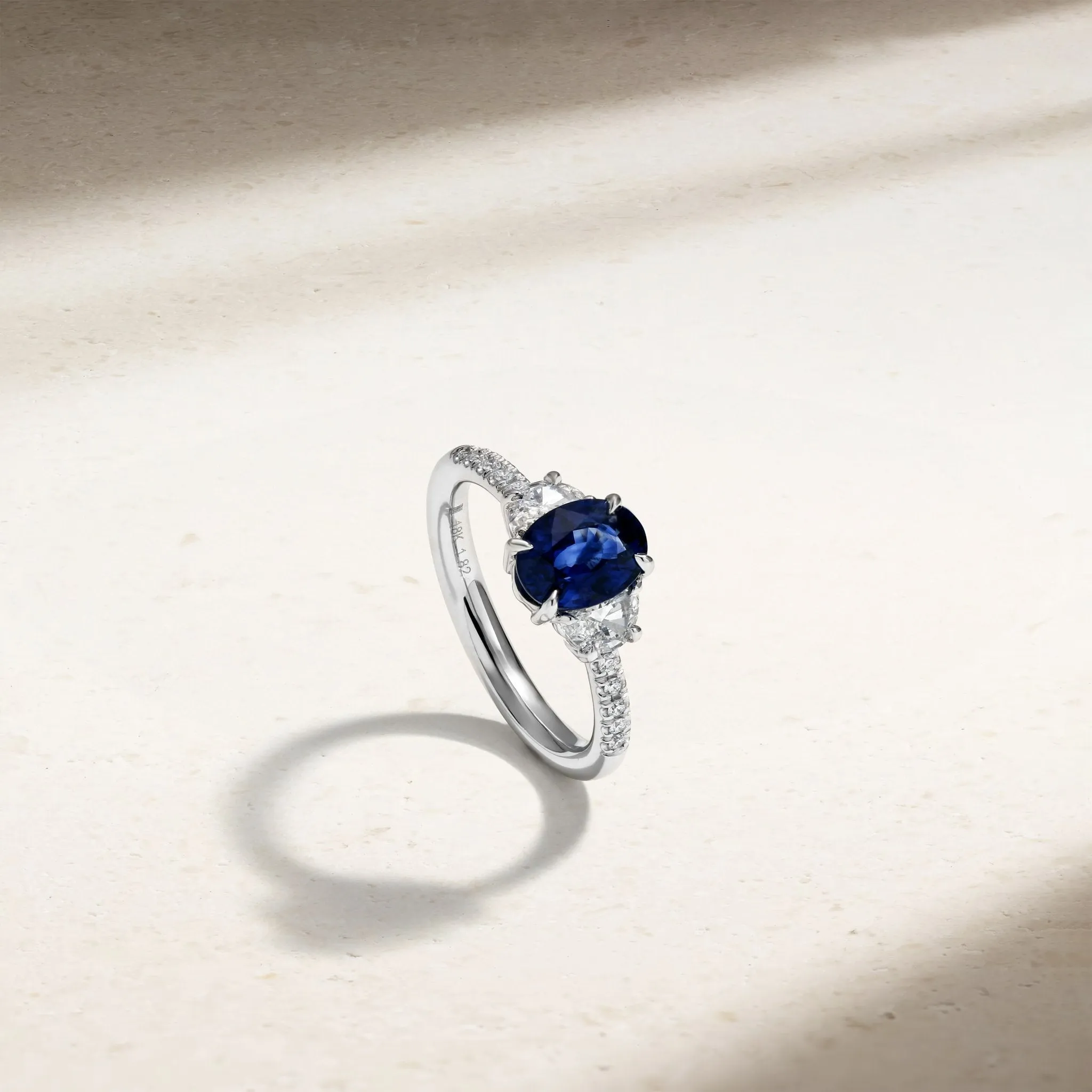 Nouveau Three Stone Oval Sapphire and Diamond Ring