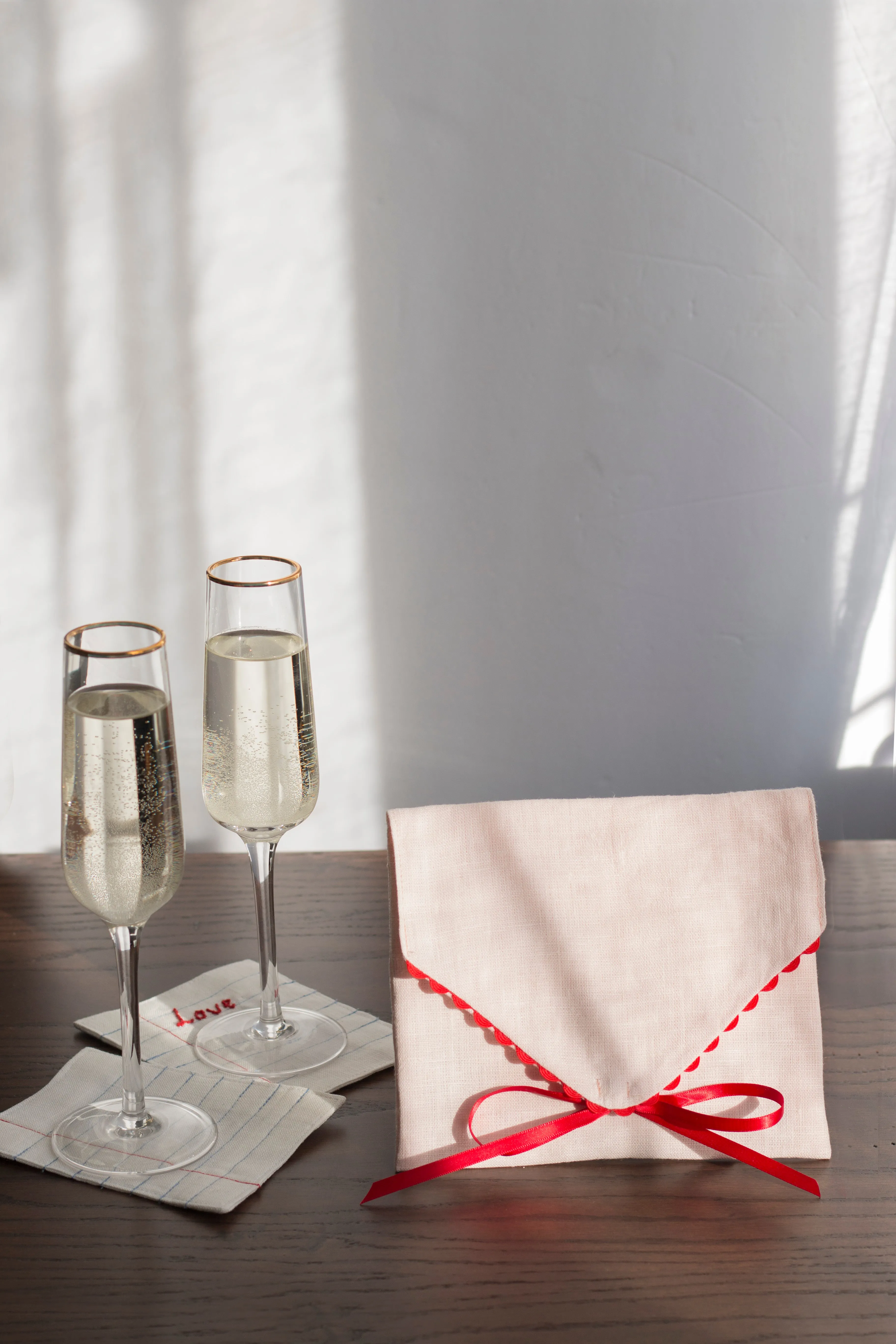 Pink linen envelope with red trim for Gifting