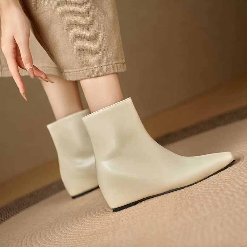 Pointed-Toe Wedge Booties