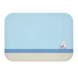 Sail Boat in the Ocean Bath Mat