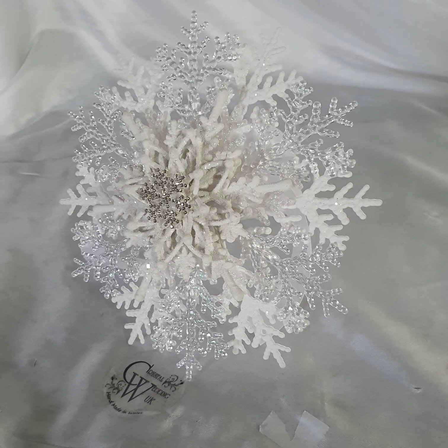 Snowflake bouquet for a Winter wedding bridesmaid by Crystal wedding uk