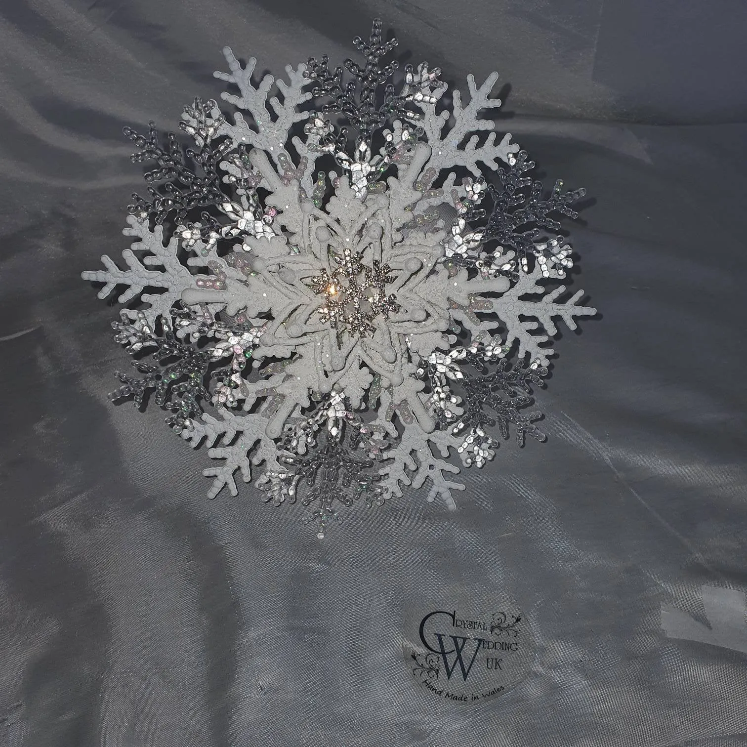 Snowflake bouquet for a Winter wedding bridesmaid by Crystal wedding uk