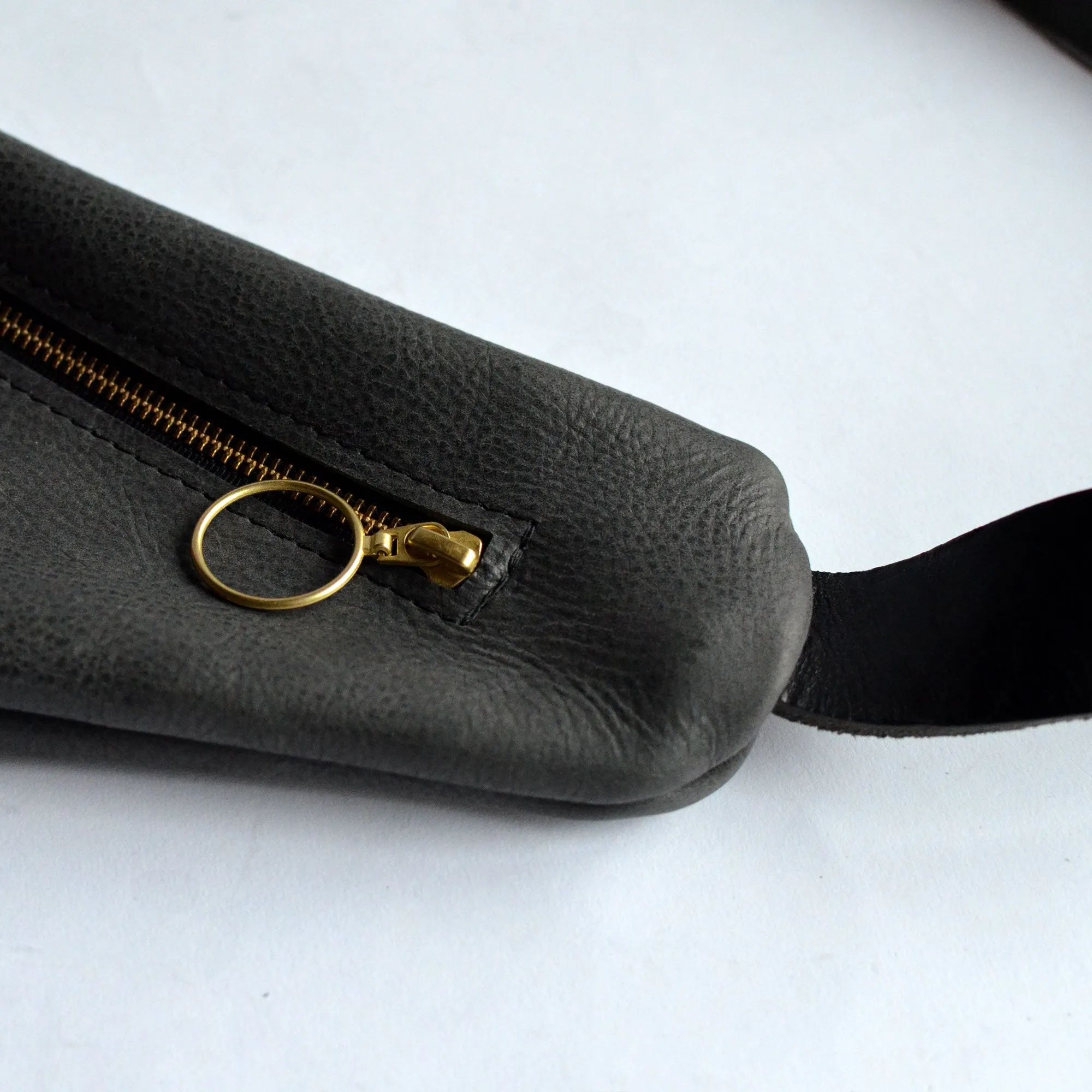 Triangle Sling Bag - Pebbled Black Slouchy Leather